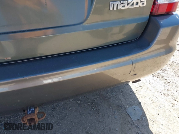 2002 Mazda Tribute LX with VIN 4F2CU08152KM02067, listed as a IAAI auction lot 42198970 with 212,613 mi miles and . Bid and sale history available at carsss.com. Image 6.