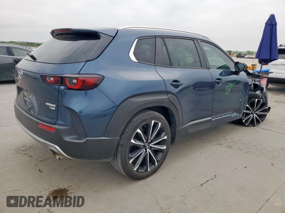 2023 Mazda CX-50 2.5 Turbo with VIN 7MMVABXY4PN148160, listed as a Copart auction lot 51306595 with 36,622 mi miles and Salvage title. Bid and sale history available at DreamBid. Image 3.
