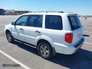 2004 Honda Pilot EX with VIN 2HKYF18424H564482, listed as a IAAI auction lot 41868124 with 173,484 mi miles. Bid and sale history available at carsss.com. Image 3.