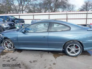 2006 Pontiac GTO with VIN 6G2VX12UX6L561098, listed as a IAAI auction lot 41487635 with 69,741 mi miles. Bid and sale history available at carsss.com. Image 14.