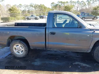 2001 Dodge Dakota with VIN 1B7FL26X91S342103, listed as a IAAI auction lot 41277465 with 157,993 mi miles. Bid and sale history available at carsss.com. Image 13.