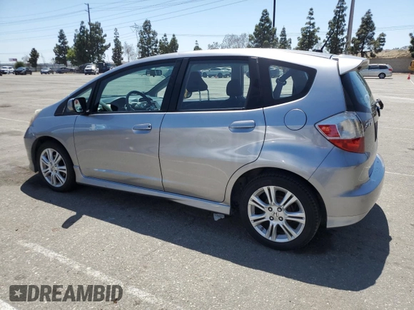 2010 Honda Fit Sport with VIN JHMGE8H69AS025801, listed as a Copart auction lot 58416375 with 216,216 mi miles and Clean title. Bid and sale history available at DreamBid. Image 2.