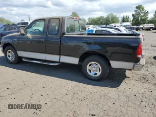 2003 Ford F-150 XL with VIN 2FTRX17293CA94389, listed as a Copart auction lot 65462825 with 165,638 mi miles and Clean title. Bid and sale history available at DreamBid. Image 2.