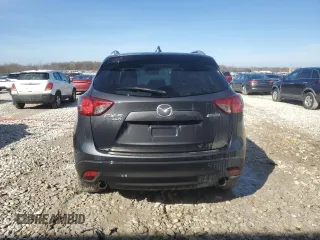 2015 Mazda CX-5 Grand Touring with VIN JM3KE4DY4F0457962, listed as a Copart auction lot 48061685 with 96,379 mi miles and Clean Title. Bid and sale history available at carsss.com. Image 6.