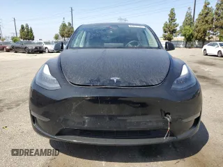 2024 Tesla Model Y Long Range with VIN 7SAYGDEE6RA219456, listed as a Copart auction lot 61855165 with 29,869 mi miles and Salvage title. Bid and sale history available at DreamBid. Image 5.