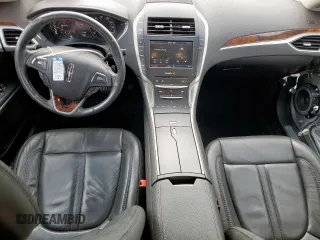 2014 Lincoln MKZ z VIN 3LN6L2G90ER815819, wystawiony jako Copart lot #61189515 z przebiegiem 101 148 mil mil oraz Szkoda całkowita • Salvage title. Historia ofert i sprzedaży dostępna na DreamBid. Obrazek 8.