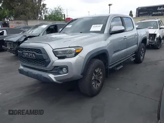 2020 Toyota Tacoma SR5 z VIN 3TMCZ5AN6LM288974, wystawiony jako IAAI lot #42185181 z przebiegiem 94 759 mil mil oraz . Historia ofert i sprzedaży dostępna na DreamBid. Obrazek 22.