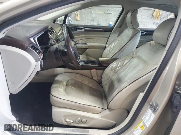 2017 Ford Fusion Titanium z VIN 3FA6P0K96HR132389, wystawiony jako Copart lot #57312665 z przebiegiem Nie podano mil oraz Szkoda całkowita • Salvage title. Historia ofert i sprzedaży dostępna na DreamBid. Obrazek 7.
