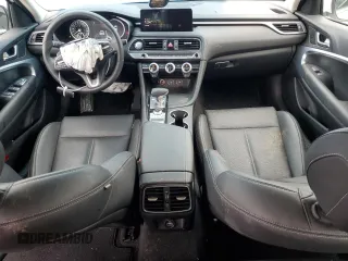 2023 Genesis G70 2.0T with VIN KMTG34TA5PU128224, listed as a Copart auction lot 82026383 with 7,311 mi miles and Salvage Title. Bid and sale history available at DreamBid. Image 8.