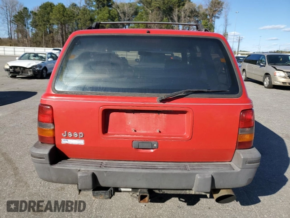 1994 Jeep Grand Cherokee Laredo with VIN 1J4GZ58S8RC254097, listed as a Copart auction lot 47379645 with 240,739 mi miles and Salvage Title. Bid and sale history available at carsss.com. Image 6.