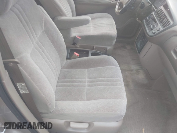 2000 Toyota Sienna LE z VIN 4T3ZF13C4YU309866, wystawiony jako IAAI lot #42184370 z przebiegiem 176 171 mil mil oraz . Historia ofert i sprzedaży dostępna na DreamBid. Obrazek 5.