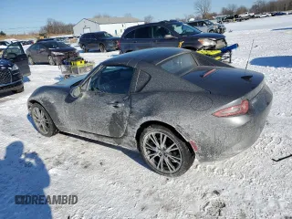 2024 Mazda MX-5 Miata Grand Touring z VIN JM1NDAM73R0607806, wystawiony jako Copart lot #88531435 z przebiegiem 3 089 mil mil oraz Szkoda całkowita • Salvage title. Historia ofert i sprzedaży dostępna na DreamBid. Obrazek 2.