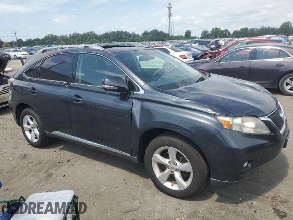 2010 Lexus RX 350 with VIN 2T2BK1BA9AC058058, listed as a Copart auction lot 65525185 with 146,659 mi miles and Salvage title. Bid and sale history available at DreamBid. Image 4.