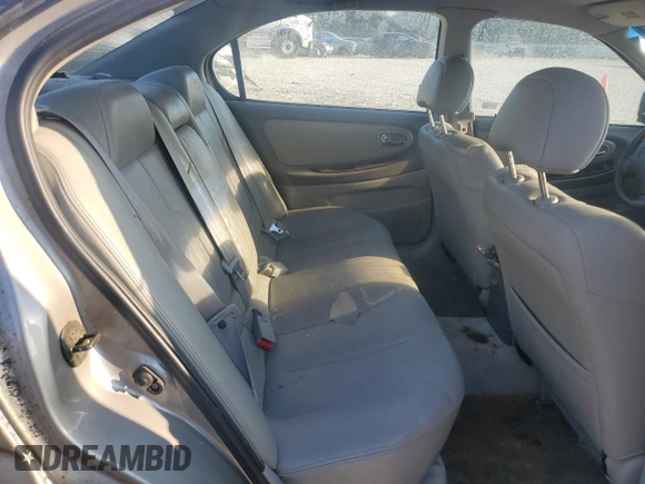 2001 Nissan Maxima GXE z VIN JN1CA31D11T828767, wystawiony jako Copart lot #69504024 z przebiegiem 177 431 mil mil oraz Szkoda całkowita • Salvage title. Historia ofert i sprzedaży dostępna na DreamBid. Obrazek 10.