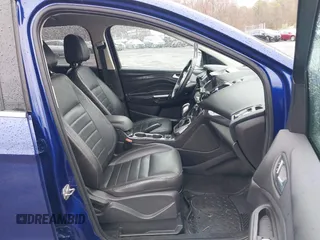 2014 Ford Escape Titanium with VIN 1FMCU9J99EUA46103, listed as a IAAI auction lot 42018097 with 169,878 mi miles and . Bid and sale history available at DreamBid. Image 5.