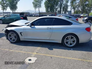 2014 BMW 4 Series 428i xDrive with VIN WBA3N9C54EF721188, listed as a IAAI auction lot 42143305 with Not provided miles and . Bid and sale history available at DreamBid. Image 13.