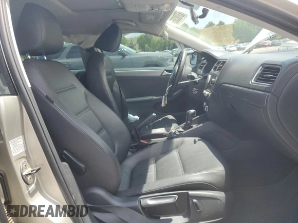 2013 Volkswagen Jetta TDI w/Premium/Nav с VIN 3VWLL7AJXDM200789, выставлен на аукционе Copart как лот 63700385 с пробегом 137 369 миль миль и Списание • Salvage title. История ставок и продаж доступна на DreamBid. Изображение 7.