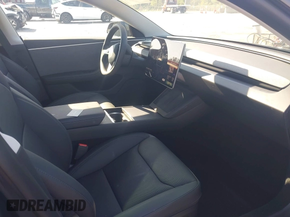 2025 Tesla Model 3 Long Range with VIN 5YJ3E1EA5SF902847, listed as a IAAI auction lot 41776081 with 2,461 mi miles and . Bid and sale history available at carsss.com. Image 5.