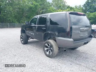 2007 Chevrolet Tahoe LT with VIN 1GNFK13017J290475, listed as a IAAI auction lot 42352808 with 148,086 mi miles and . Bid and sale history available at DreamBid. Image 3.