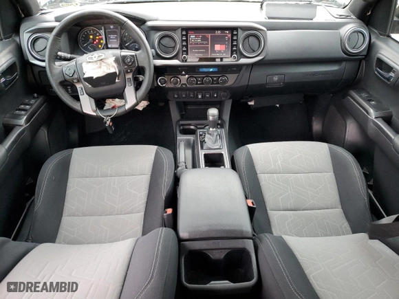 2023 Toyota Tacoma 4WD SR with VIN 3TMCZ5AN8PM644718, listed as a Copart auction lot 88050345 with 12,516 mi miles and Salvage Title. Bid and sale history available at carsss.com. Image 8.