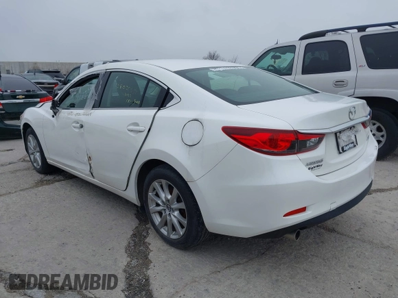 2015 Mazda Mazda6 i Sport with VIN JM1GJ1U68F1170884, listed as a IAAI auction lot 39229424 with 99,317 mi miles. Bid and sale history available at carsss.com. Image 3.