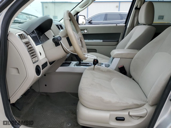 2011 Mercury Mariner with VIN 4M2CN8BG2BKJ05017, listed as a Copart auction lot 86358314 with 181,944 mi miles and Salvage Title. Bid and sale history available at carsss.com. Image 7.