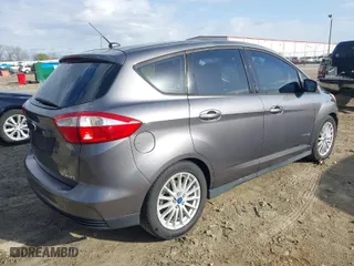 2013 Ford C-Max Hybrid SE with VIN 1FADP5AU6DL529197, listed as a IAAI auction lot 41810975 with 204,633 mi miles. Bid and sale history available at carsss.com. Image 4.