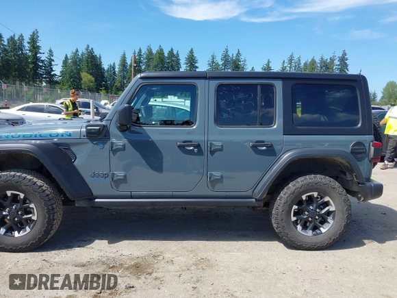 2024 Jeep Wrangler Rubicon X z VIN 1C4RJXR6XRW240316, wystawiony jako IAAI lot #42477607 z przebiegiem 41 375 mil mil oraz . Historia ofert i sprzedaży dostępna na DreamBid. Obrazek 14.