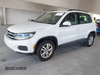 2017 Volkswagen Tiguan S with VIN WVGAV7AX8HK028540, listed as a IAAI auction lot 42256745 with 118,394 mi miles and . Bid and sale history available at DreamBid. Image 2.