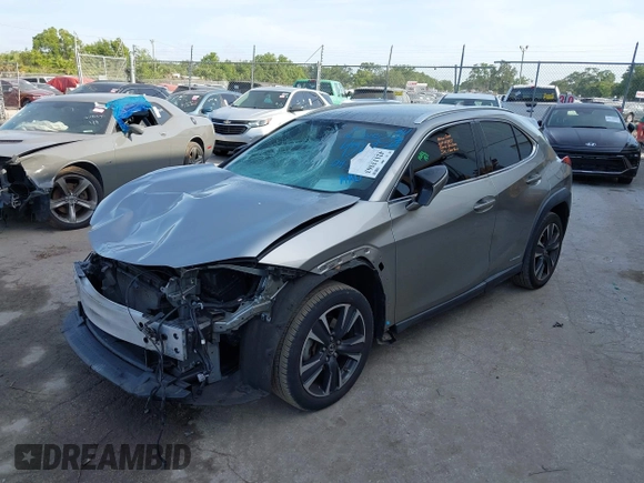 2020 Lexus UX 250h with VIN JTHX9JBHXL2033589, listed as a IAAI auction lot 42113363 with 71,669 mi miles and . Bid and sale history available at DreamBid. Image 2.