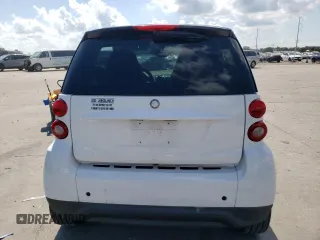 2015 Smart fortwo Passion z VIN WMEEJ3BAXFK820031, wystawiony jako Copart lot #73051554 z przebiegiem Nie podano mil oraz Szkoda całkowita • Salvage title. Historia ofert i sprzedaży dostępna na DreamBid. Obrazek 6.