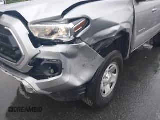 2023 Toyota Tacoma SR with VIN 3TYAX5GN0PT071080, listed as a IAAI auction lot 42426897 with 58,017 mi miles and . Bid and sale history available at DreamBid. Image 6.