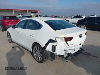 2023 Mazda 3 S Premium with VIN 3MZBPBDM7PM363574, listed as a IAAI auction lot 41585343 with 28,111 mi miles and . Bid and sale history available at DreamBid. Image 3.