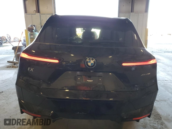 2023 BMW iX xDrive50 with VIN WB523CF08PCM77367, listed as a Copart auction lot 43043695 with 17,213 mi miles and Salvage Title. Bid and sale history available at carsss.com. Image 6.