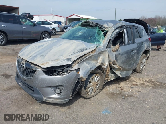 2015 Mazda CX-5 Touring with VIN JM3KE2CY6F0432910, listed as a IAAI auction lot 41784545 with 210,787 mi miles. Bid and sale history available at carsss.com. Image 22.