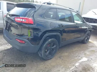 2017 Jeep Cherokee Altitude with VIN 1C4PJLAB7HW660624, listed as a IAAI auction lot 41488683 with 106,963 mi miles and . Bid and sale history available at DreamBid. Image 4.