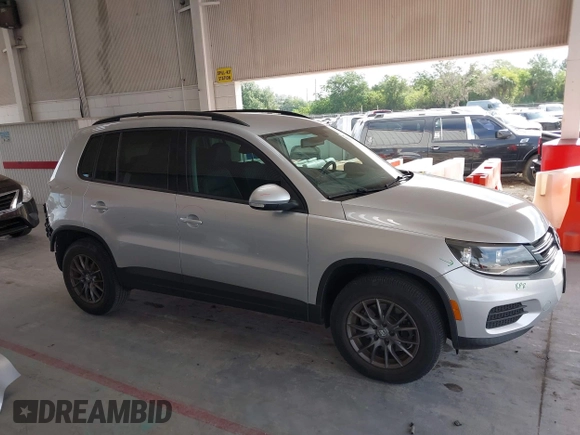 2016 Volkswagen Tiguan S with VIN WVGBV7AX2GW535784, listed as a IAAI auction lot 42130041 with 35,718 mi miles and . Bid and sale history available at DreamBid. Image 14.