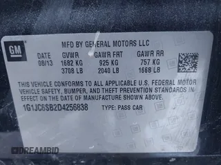 2013 Chevrolet Sonic LT with VIN 1G1JC6SB2D4256838, listed as a IAAI auction lot 41443769 with 98,839 mi miles. Bid and sale history available at carsss.com. Image 9.