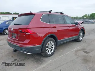 2018 Volkswagen Tiguan SEL with VIN 3VV3B7AXXJM086672, listed as a IAAI auction lot 42006533 with 90,511 mi miles and . Bid and sale history available at DreamBid. Image 4.