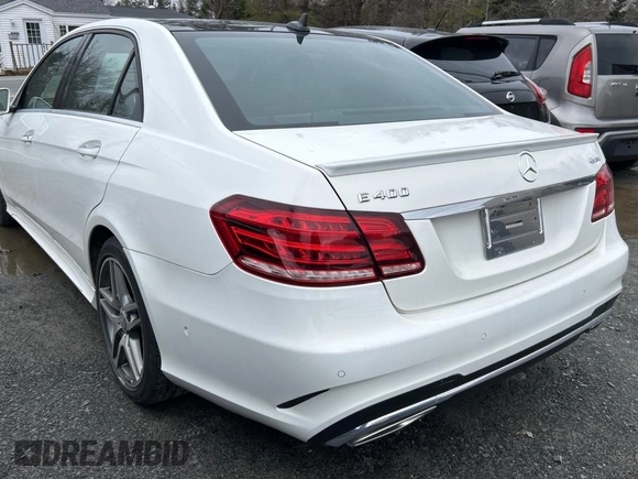 2016 Mercedes-Benz E-Class E 400 with VIN WDDHF6HB4GB200197, listed as a Copart auction lot 82809674 with 89,649 mi miles and Clean Title. Bid and sale history available at carsss.com. Image 4.