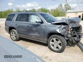 2020 Chevrolet Tahoe Premier with VIN 1GNSKCKC7LR125399, listed as a Copart auction lot 54702635 with 134,684 mi miles and Salvage title. Bid and sale history available at DreamBid. Image 4.