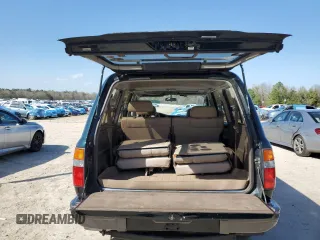1995 Toyota Land Cruiser z VIN JT3DJ81W6S0106332, wystawiony jako Copart lot #47772055 z przebiegiem 214 499 mil mil oraz Szkoda całkowita • Salvage title. Historia ofert i sprzedaży dostępna na DreamBid. Obrazek 6.