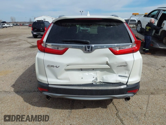2017 Honda CR-V Touring with VIN 5J6RW2H95HL044505, listed as a IAAI auction lot 41856975 with 117,826 mi miles. Bid and sale history available at carsss.com. Image 16.