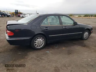 2000 Mercedes-Benz E-Class with VIN WDBJF65J5YB068297, listed as a Copart auction lot 69199004 with 236,751 mi miles and Salvage Title. Bid and sale history available at carsss.com. Image 3.