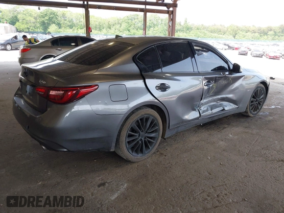 2019 Infiniti Q50 Luxe z VIN JN1EV7AR8KM594171, wystawiony jako IAAI lot #42428037 z przebiegiem 70 086 mil mil oraz . Historia ofert i sprzedaży dostępna na DreamBid. Obrazek 4.