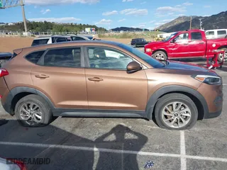 2016 Hyundai Tucson SE with VIN KM8J23A47GU166435, listed as a IAAI auction lot 41952751 with 66,785 mi miles. Bid and sale history available at carsss.com. Image 12.