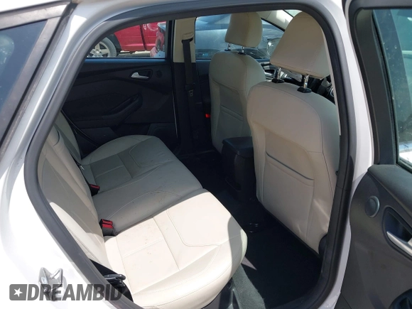 2016 Ford Focus Titanium with VIN 1FADP3N28GL222941, listed as a IAAI auction lot 42050881 with 97,001 mi miles and . Bid and sale history available at DreamBid. Image 8.