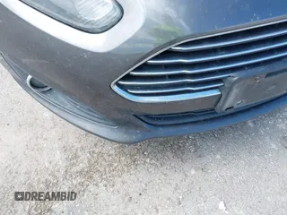 2017 Ford Fiesta SE z VIN 3FADP4BJ2HM134825, wystawiony jako IAAI lot #42331095 z przebiegiem 117 794 mil mil oraz . Historia ofert i sprzedaży dostępna na DreamBid. Obrazek 6.