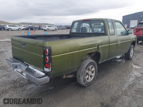 1996 Nissan Frontier XE with VIN 1N6SD16SXTC322219, listed as a Copart auction lot 49043685 with 102,964 mi miles and Salvage title. Bid and sale history available at DreamBid. Image 4.