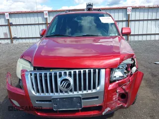 2008 Mercury Mariner Premier with VIN 4M2CU97178KJ00739, listed as a IAAI auction lot 42312408 with 167,591 mi miles and . Bid and sale history available at DreamBid. Image 12.